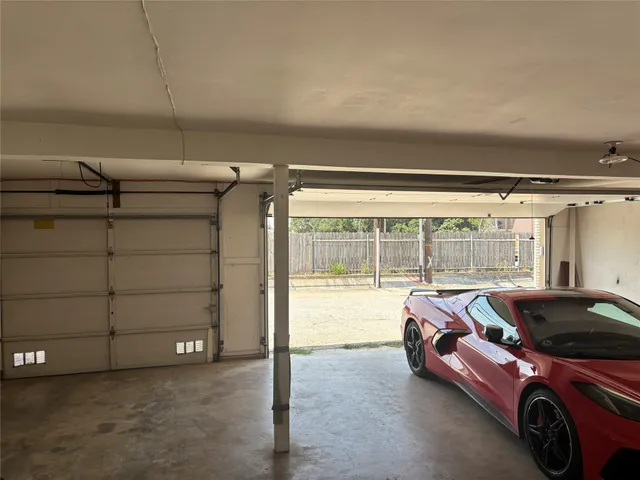 a room with a bed and a window