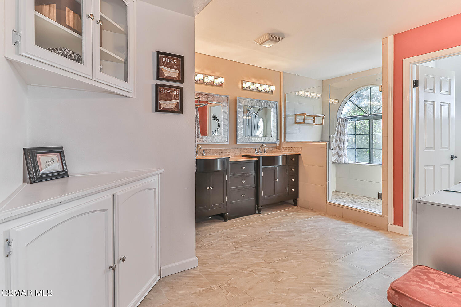 2911 Fanshell Walk Oxnard, CA 93035 - Photo 23 of 42 a spacious bathroom with a vanity a sink a mirror and a shower