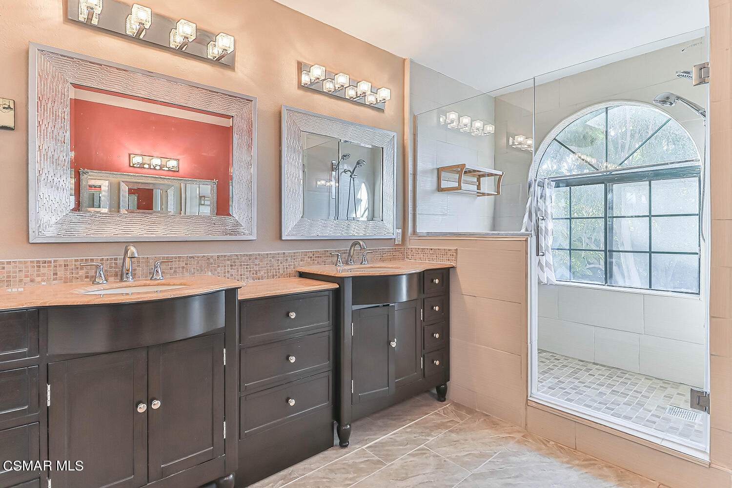 2911 Fanshell Walk Oxnard, CA 93035 - Photo 24 of 42 a bathroom with a sink and a mirror