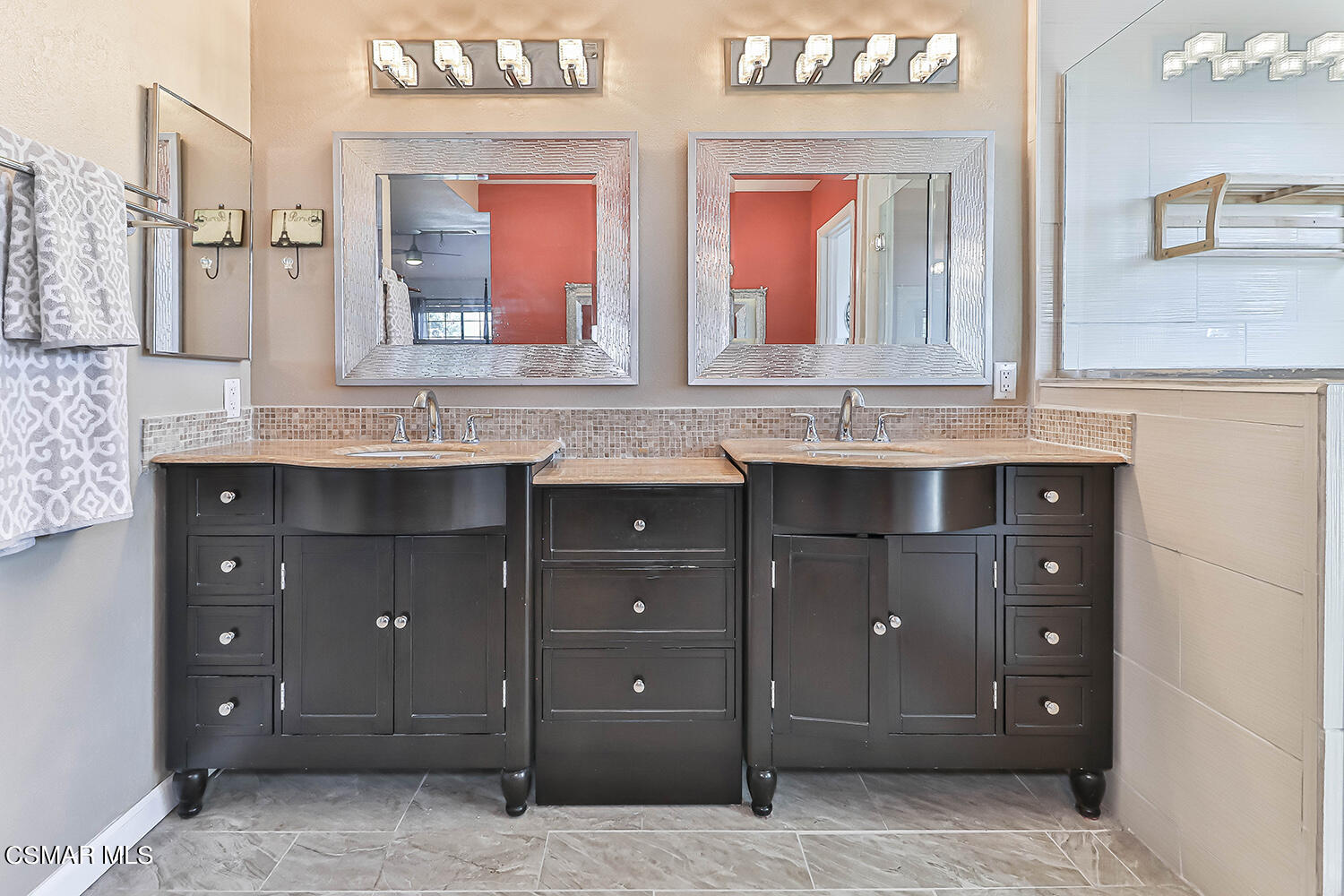2911 Fanshell Walk Oxnard, CA 93035 - Photo 25 of 42 a bathroom with a granite countertop sink and a mirror