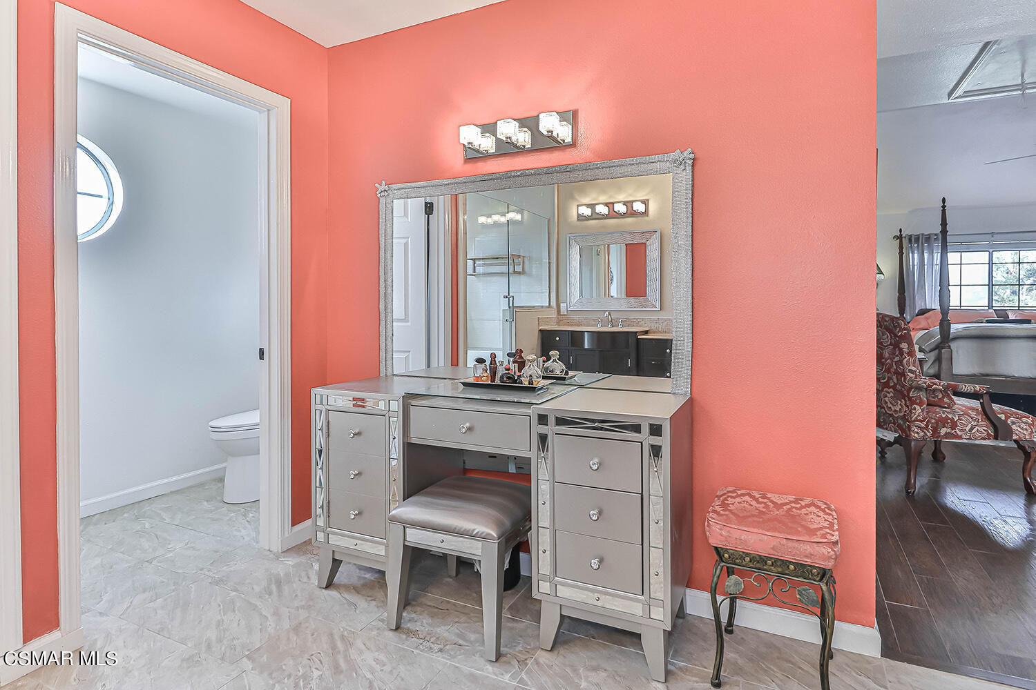 2911 Fanshell Walk Oxnard, CA 93035 - Photo 26 of 42 a bathroom with a sink vanity and a mirror