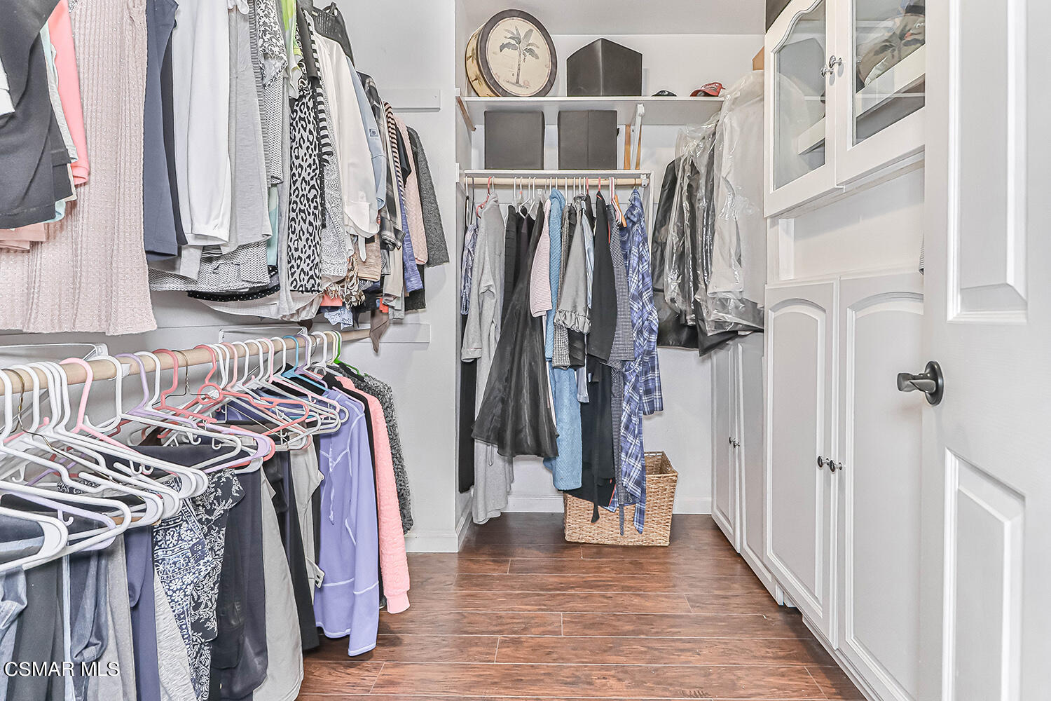 2911 Fanshell Walk Oxnard, CA 93035 - Photo 27 of 42 a view of walk in closet with clothes