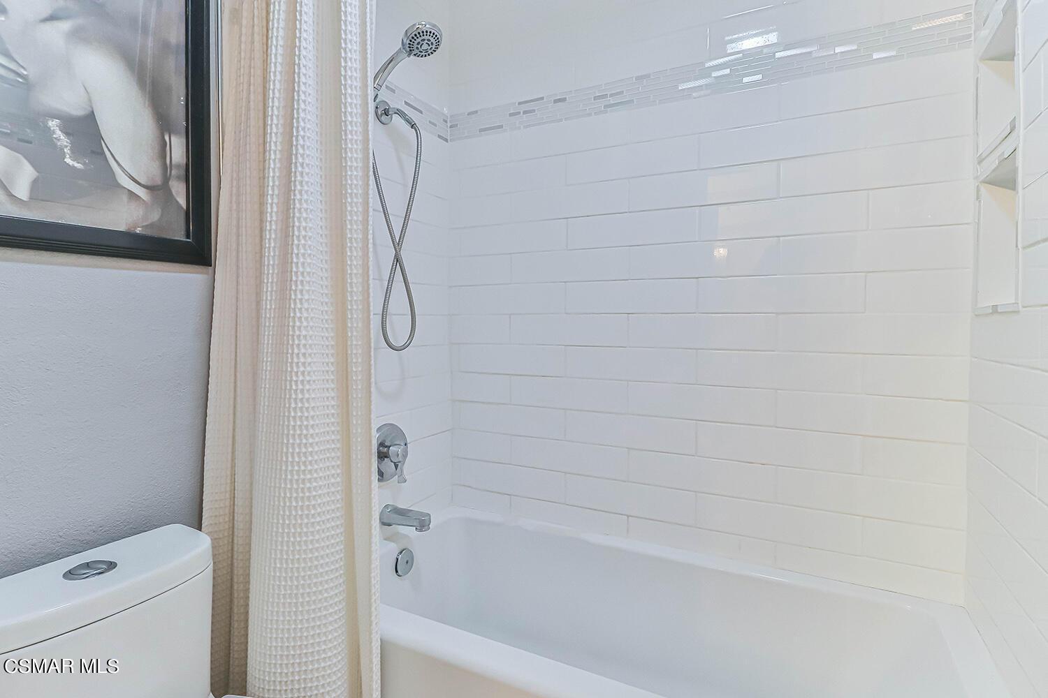 2911 Fanshell Walk Oxnard, CA 93035 - Photo 32 of 42 a bathroom with a shower and a toilet