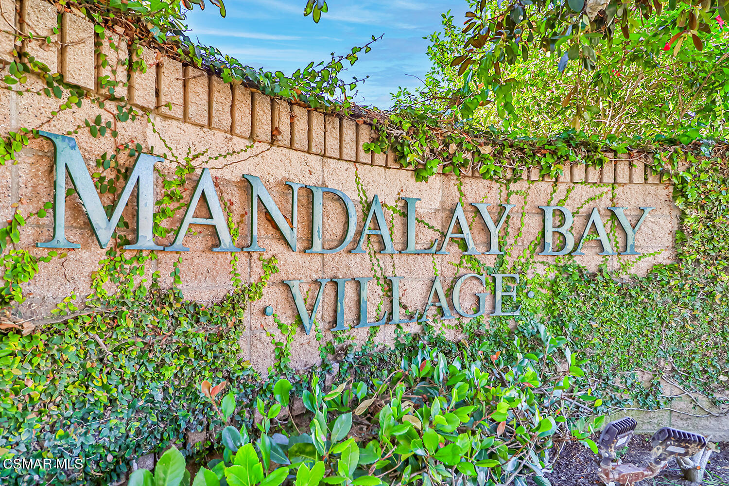2911 Fanshell Walk Oxnard, CA 93035 - Photo 39 of 42 a sign that is in front of a brick building