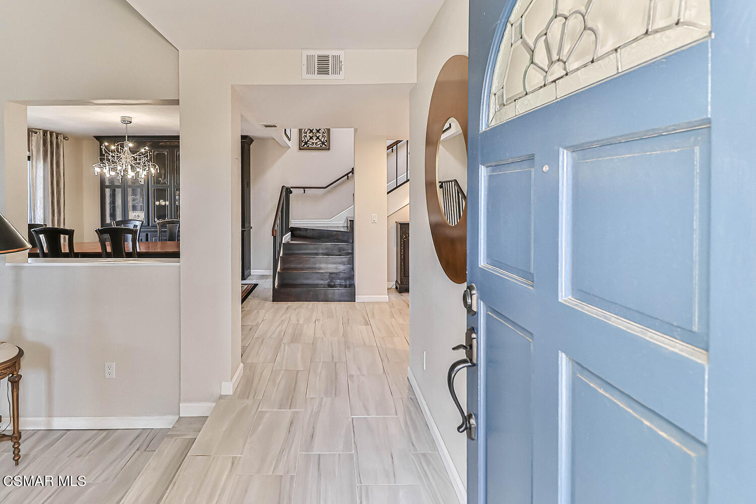 2911 Fanshell Walk Oxnard, CA 93035 - Photo 7 of 42 a view of entryway with wooden floor and stairs