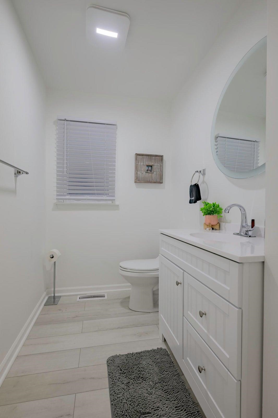 377 Rattler Road Vesuvius, VA 24483 - Photo 25 of 66 Half bath off the hallway on the main level.