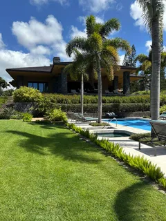 a view of a house with a swimming pool