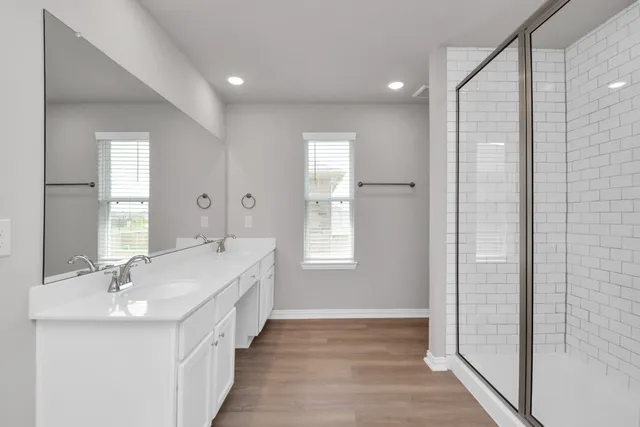 a view of a bathroom from the hallway