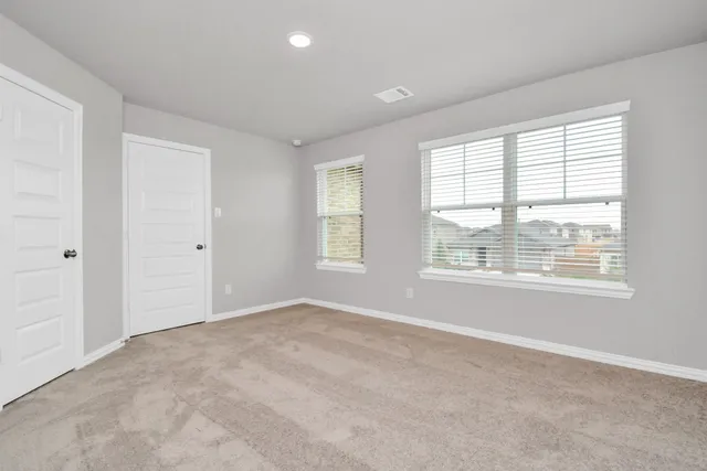 a view of a park with swings