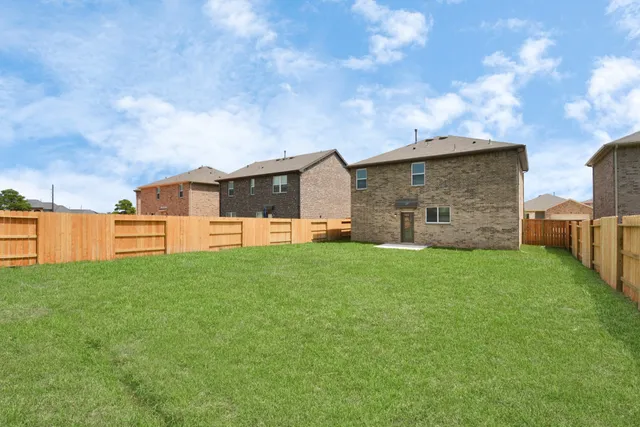 a terrace with outdoor seating and city view