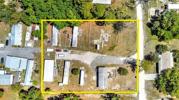 8333 Emmons Avenue New Port Richey, FL 34653 - Photo 1 of 14 a view of building with a street