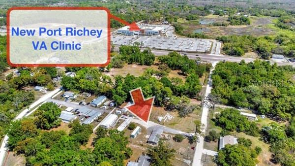8333 Emmons Avenue New Port Richey, FL 34653 - Photo 2 of 14 an aerial view of a sign board