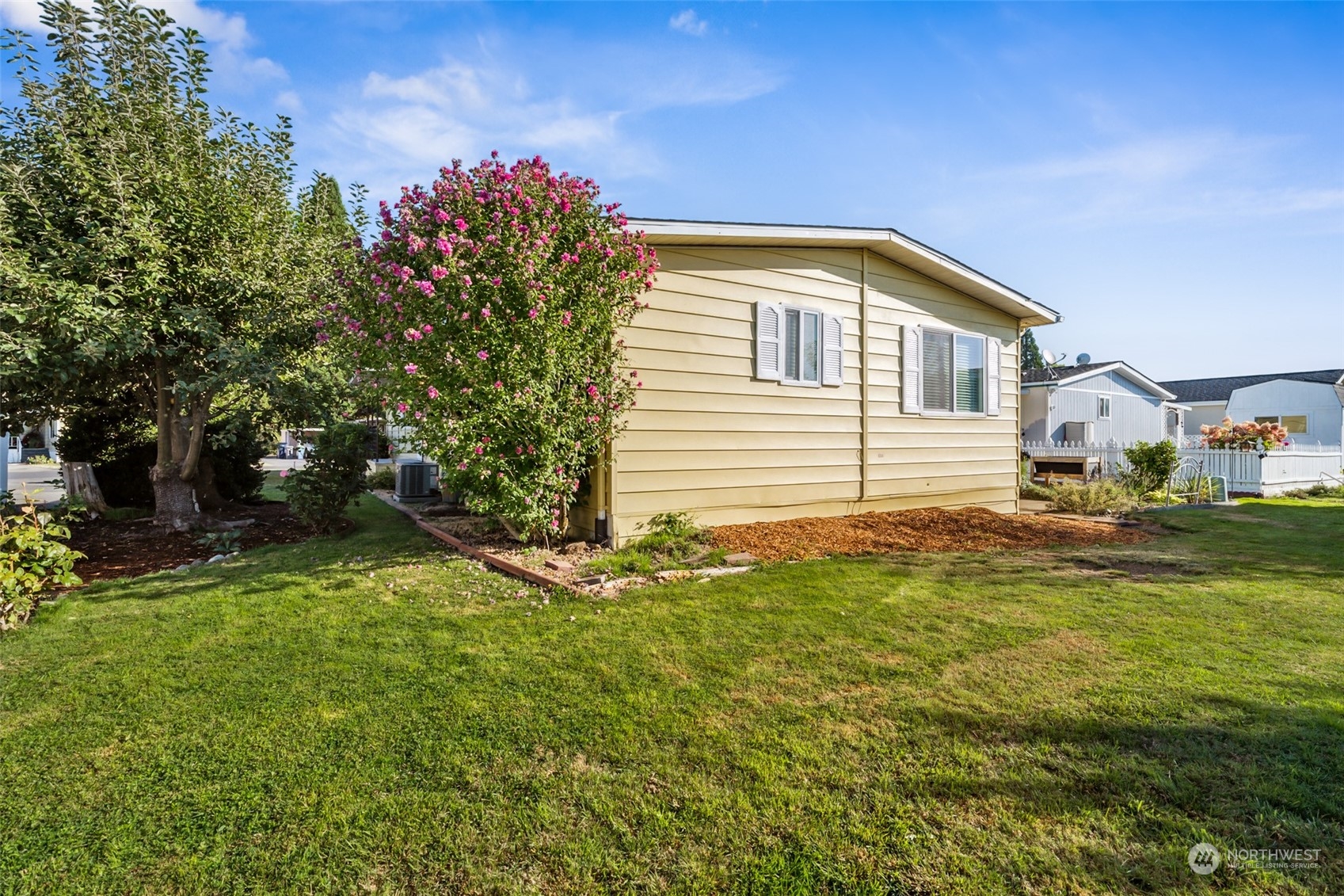 1272 Spruce Drive Enumclaw, WA 98022 - Photo 17 of 23 a view of a house with a backyard
