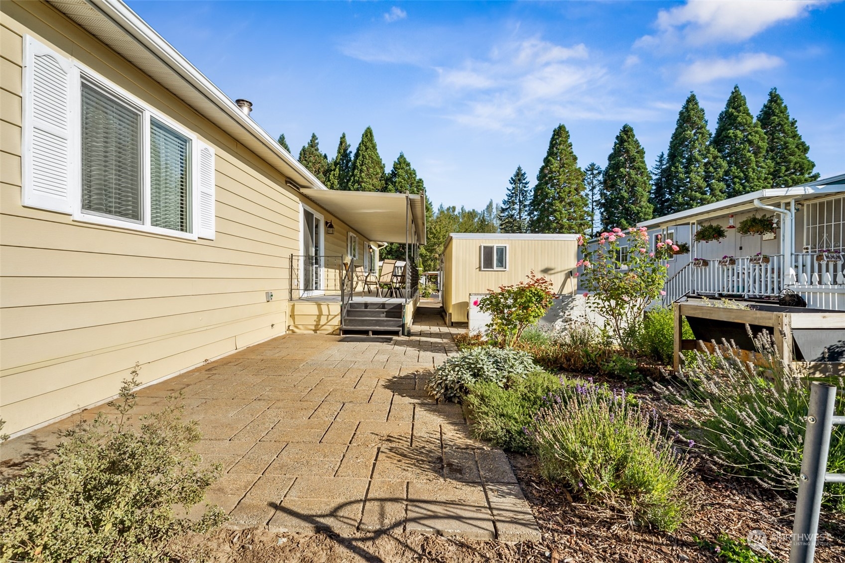 1272 Spruce Drive Enumclaw, WA 98022 - Photo 19 of 23 a view of a backyard with sitting area