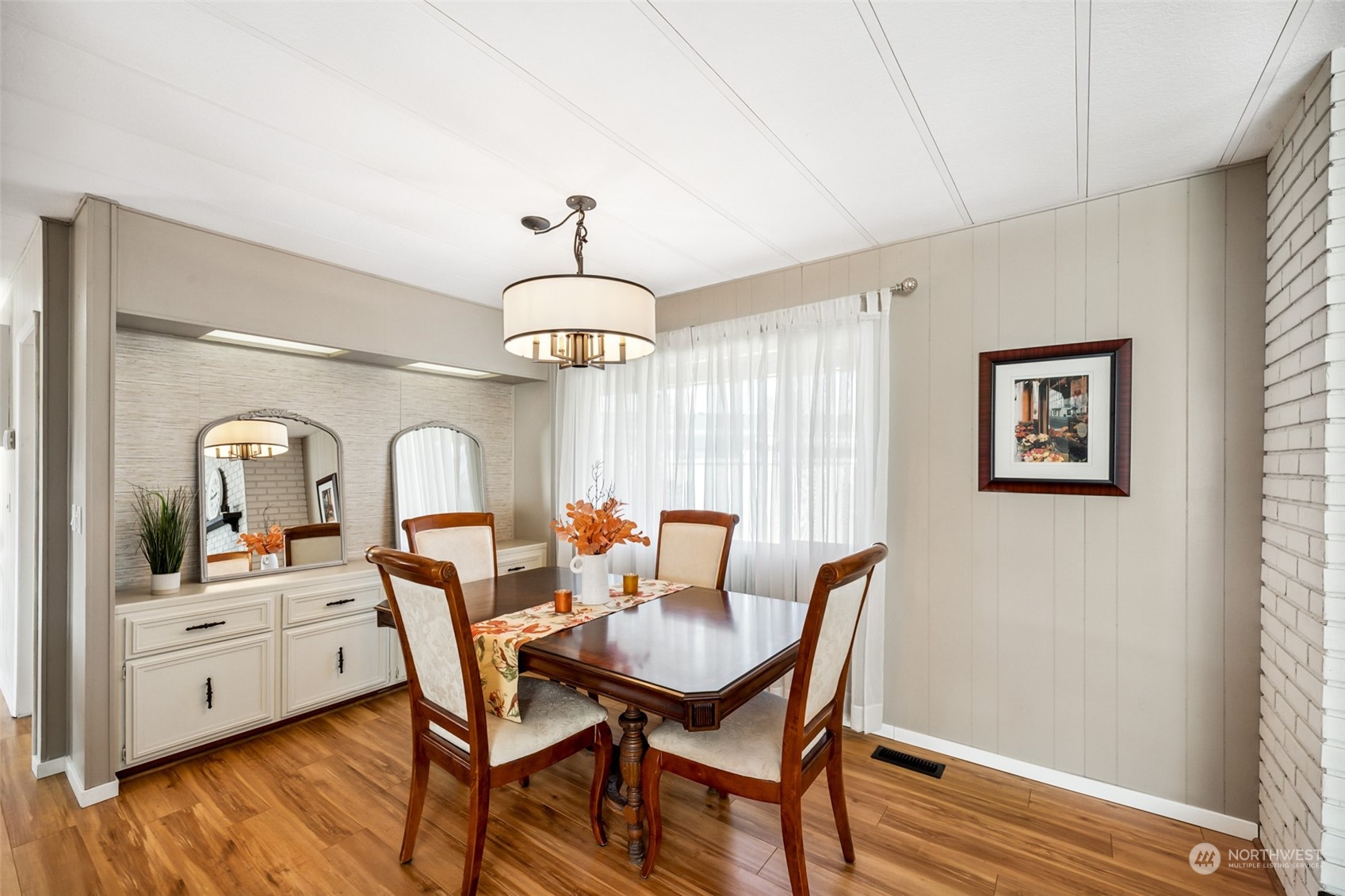 1272 Spruce Drive Enumclaw, WA 98022 - Photo 2 of 23 a view of a dining room with furniture window and wooden floor