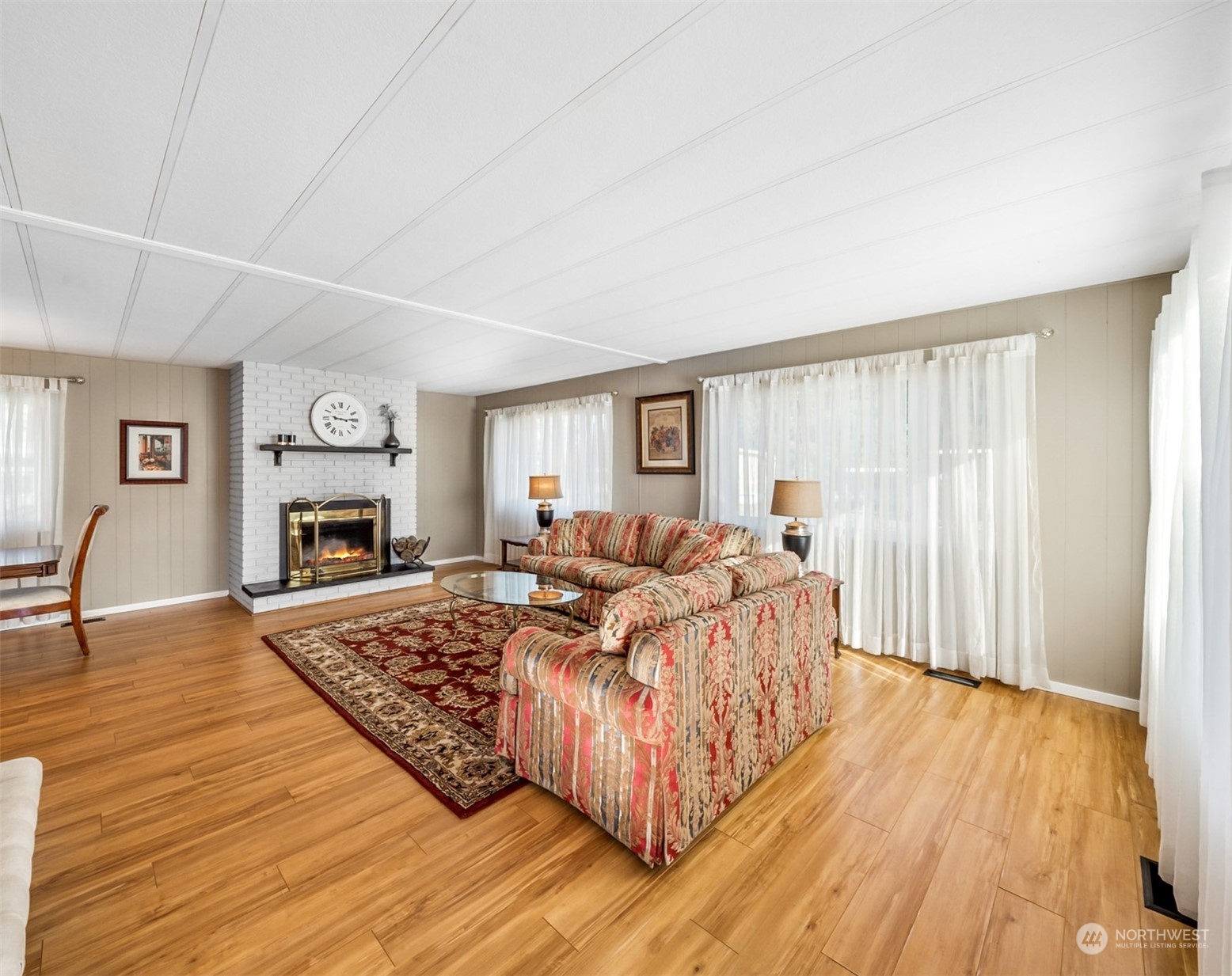 1272 Spruce Drive Enumclaw, WA 98022 - Photo 5 of 23 a bed room with a bed and a fireplace