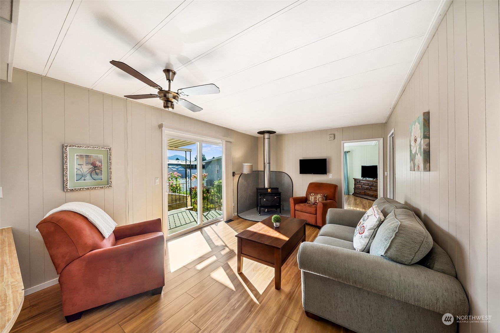 1272 Spruce Drive Enumclaw, WA 98022 - Photo 8 of 23 a living room with furniture ceiling fan and a window