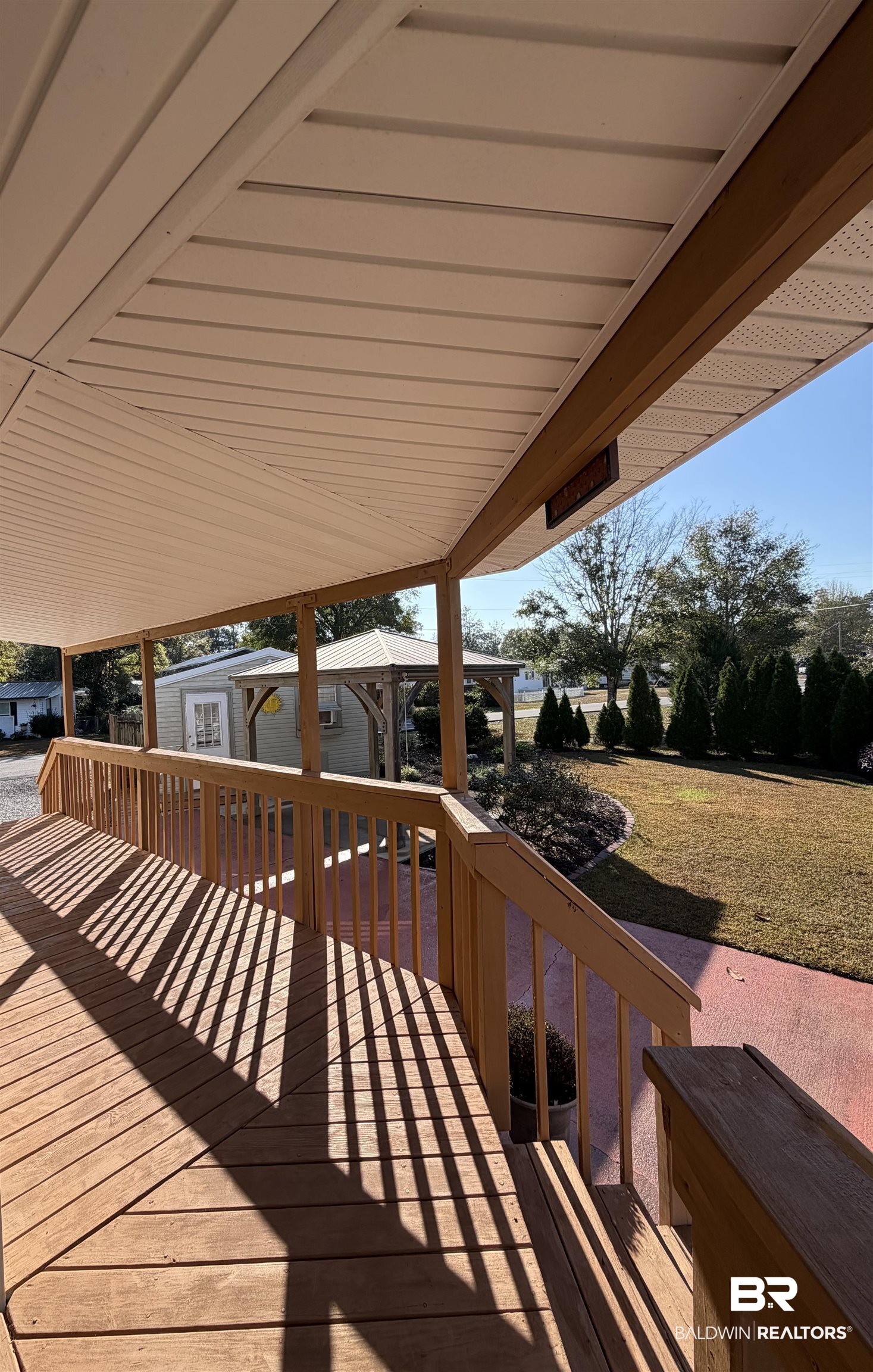 675 Escambia Loop Lillian, AL 36549 - Photo 11 of 44 View of wooden terrace