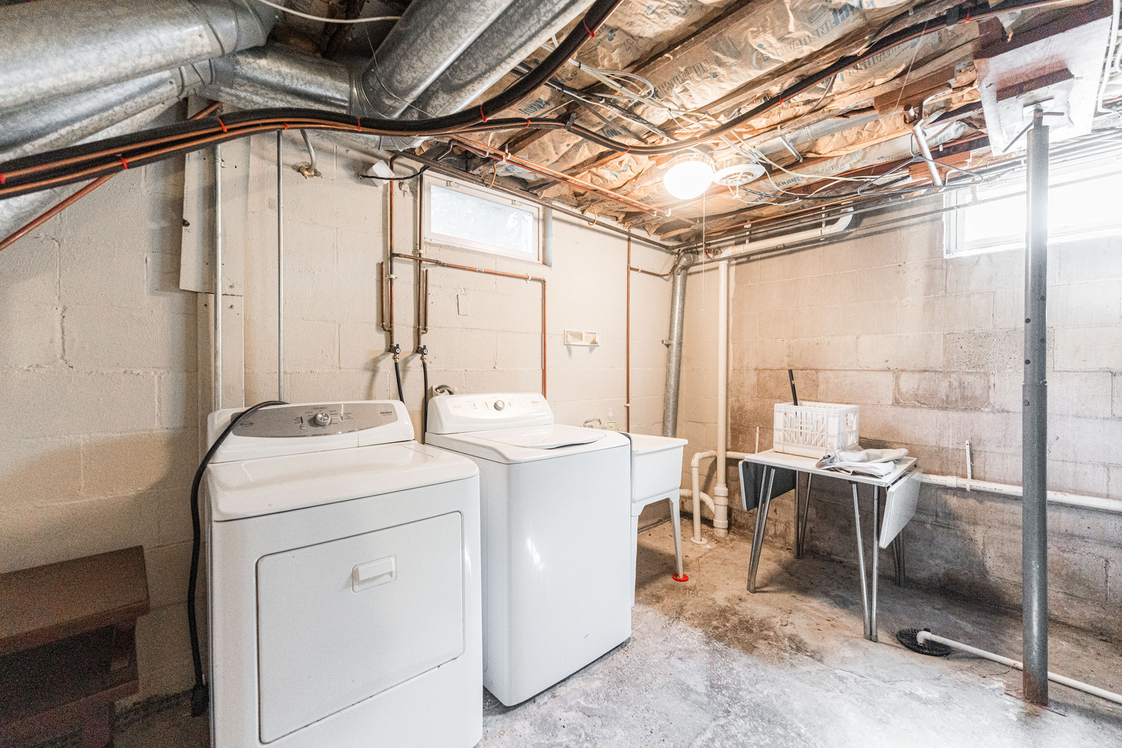 512 North 6th Street, Unit 1 DeKalb, IL 60115 - Photo 13 of 15 a utility room with dryer and washer