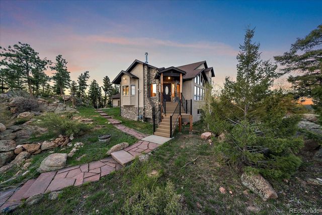 a backyard of a house with lots of green space