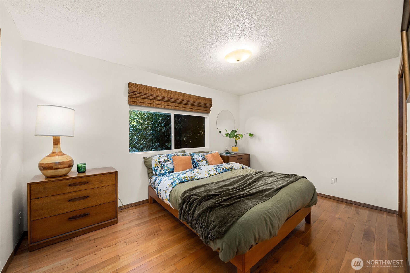 30024 2nd Avenue Southwest Federal Way, WA 98023 - Photo 15 of 40 a bedroom with a bed and a window