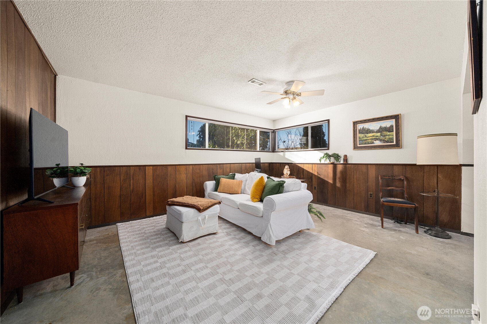 30024 2nd Avenue Southwest Federal Way, WA 98023 - Photo 21 of 40 a living room with furniture and a flat screen tv