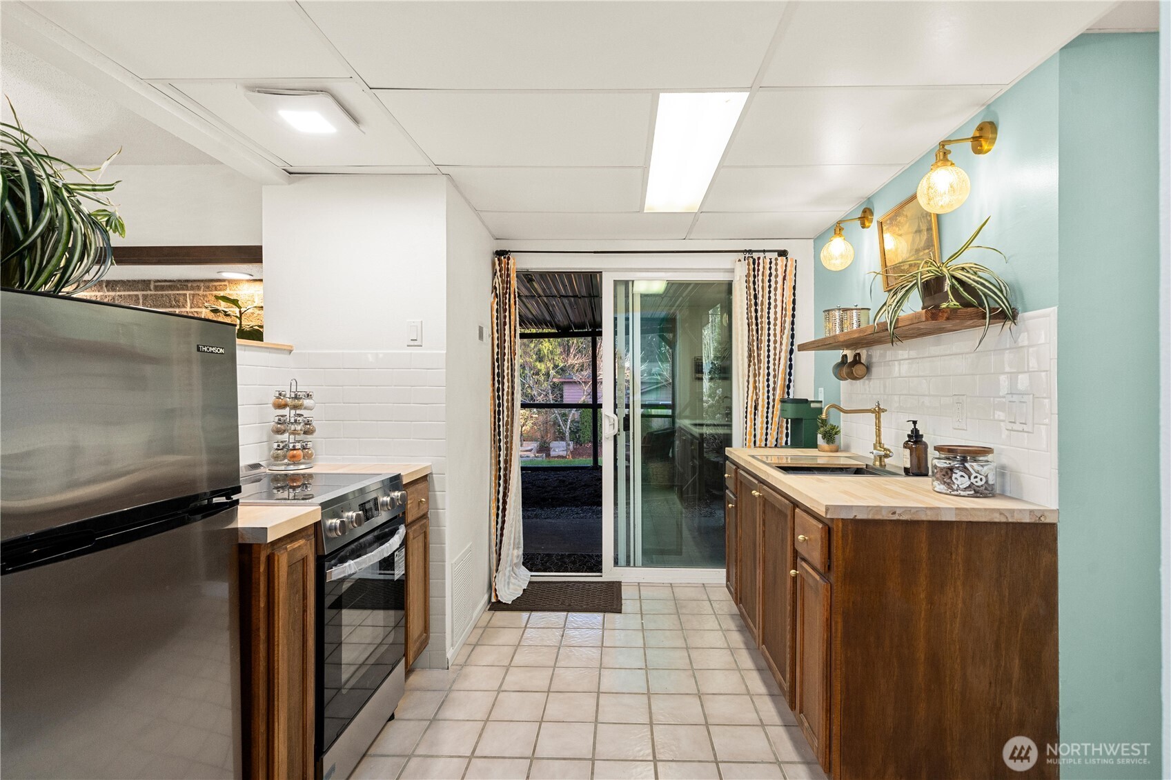 30024 2nd Avenue Southwest Federal Way, WA 98023 - Photo 23 of 40 a kitchen with a sink appliances and cabinets