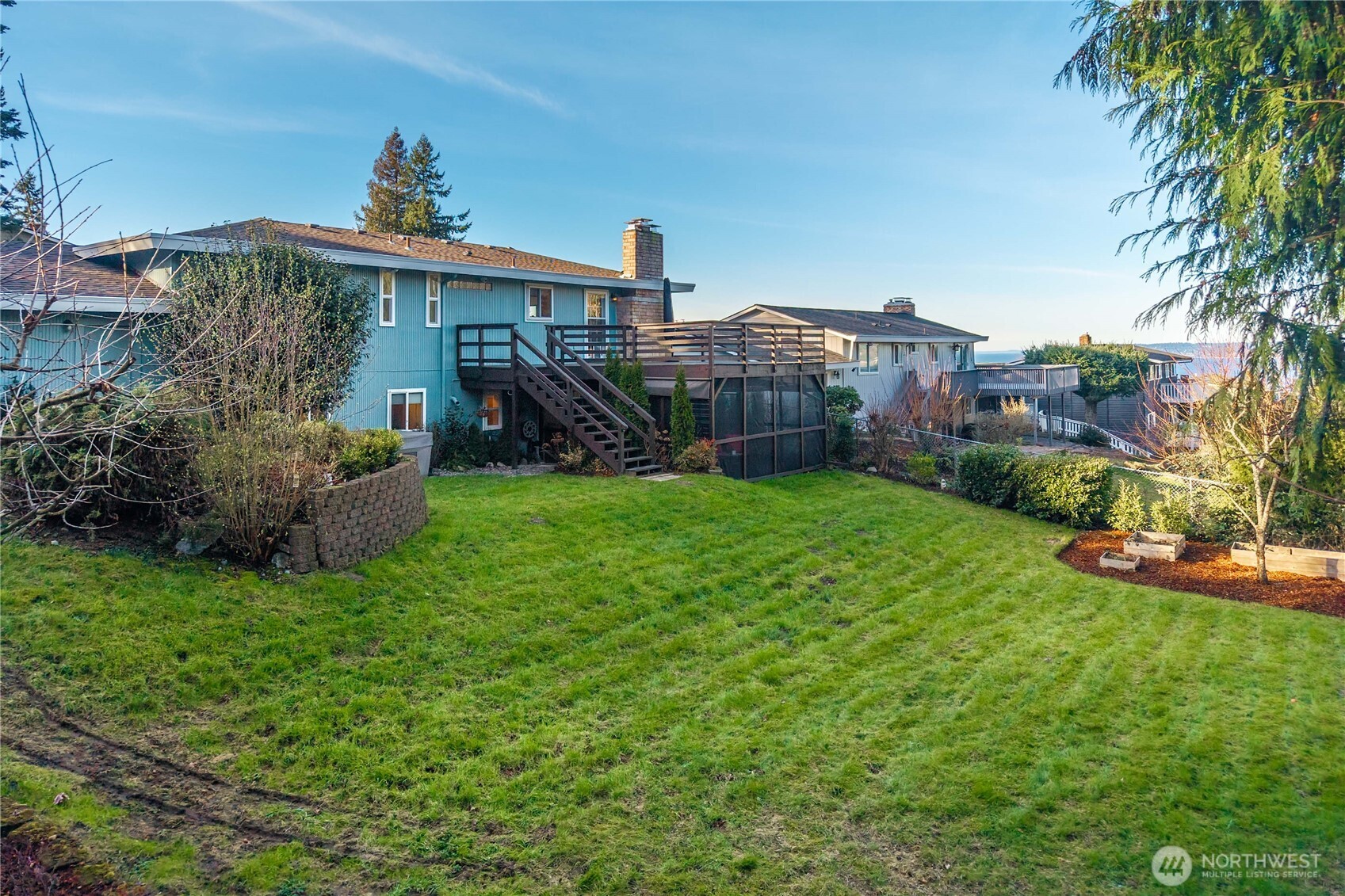 30024 2nd Avenue Southwest Federal Way, WA 98023 - Photo 31 of 40 a view of a house with a yard and potted plants