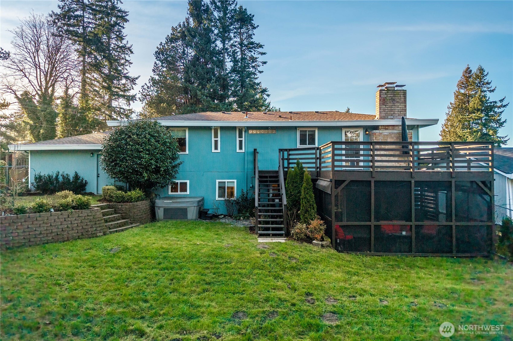 30024 2nd Avenue Southwest Federal Way, WA 98023 - Photo 32 of 40 a view of a house with backyard sitting area and garden