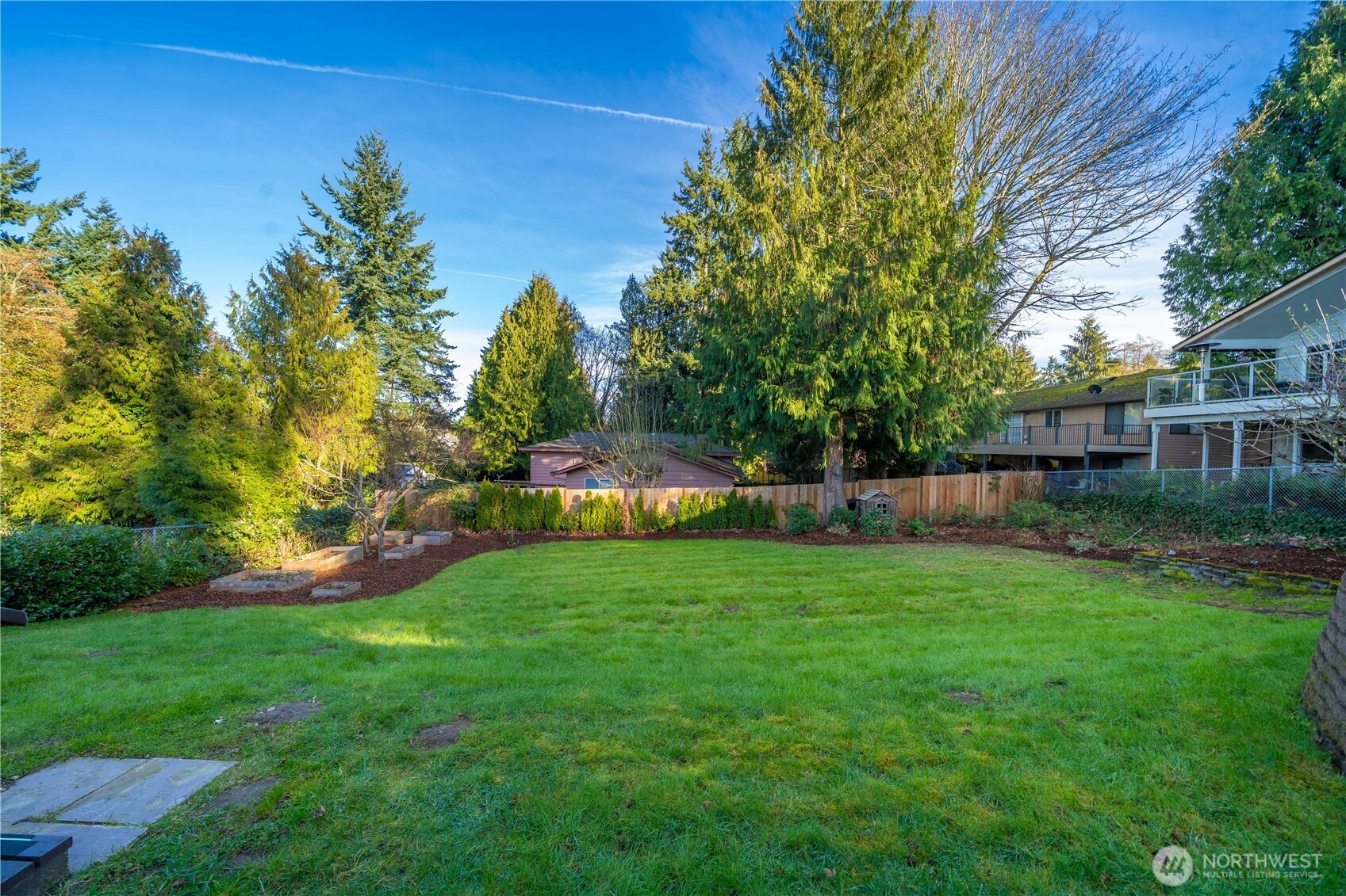 30024 2nd Avenue Southwest Federal Way, WA 98023 - Photo 34 of 40 a backyard of a house with lots of green space