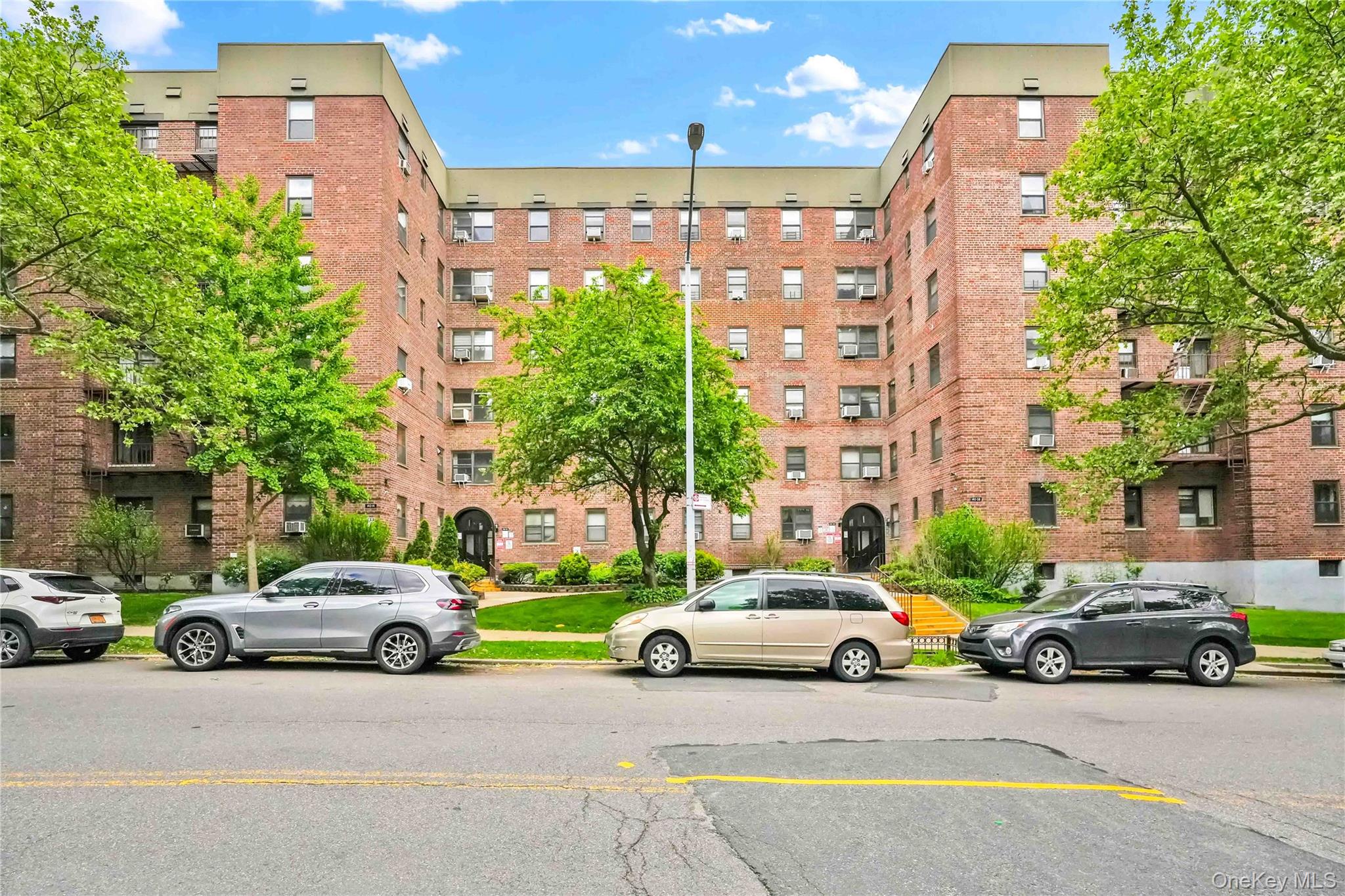 140-08 28th Road, Unit 1C Queens, NY 11354 - Photo 13 of 14 a view of a cars parked in front of a building