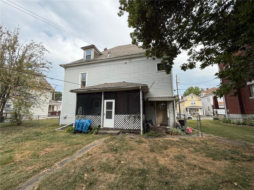 233 West Brady Street Butler, PA 16001 - Photo 6 of 10 a front view of a house with a yard