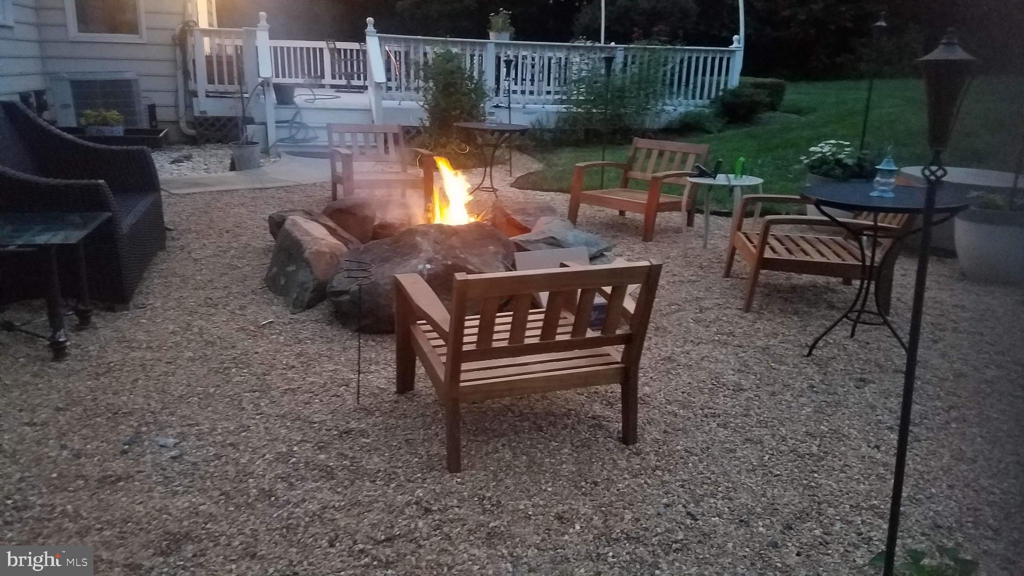 20814 Furr Road Round Hill, VA 20141 - Photo 6 of 41 Enjoy your fire pit in the private backyard.
