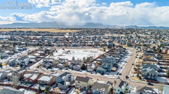 10165 Angeles Road Peyton, CO 80831 - Photo 7 of 38 Drone / aerial view featuring a mountain view