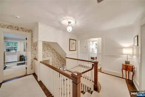 a view of a hallway with workspace
