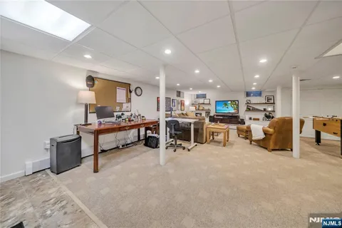 a room with lots of furniture and a table