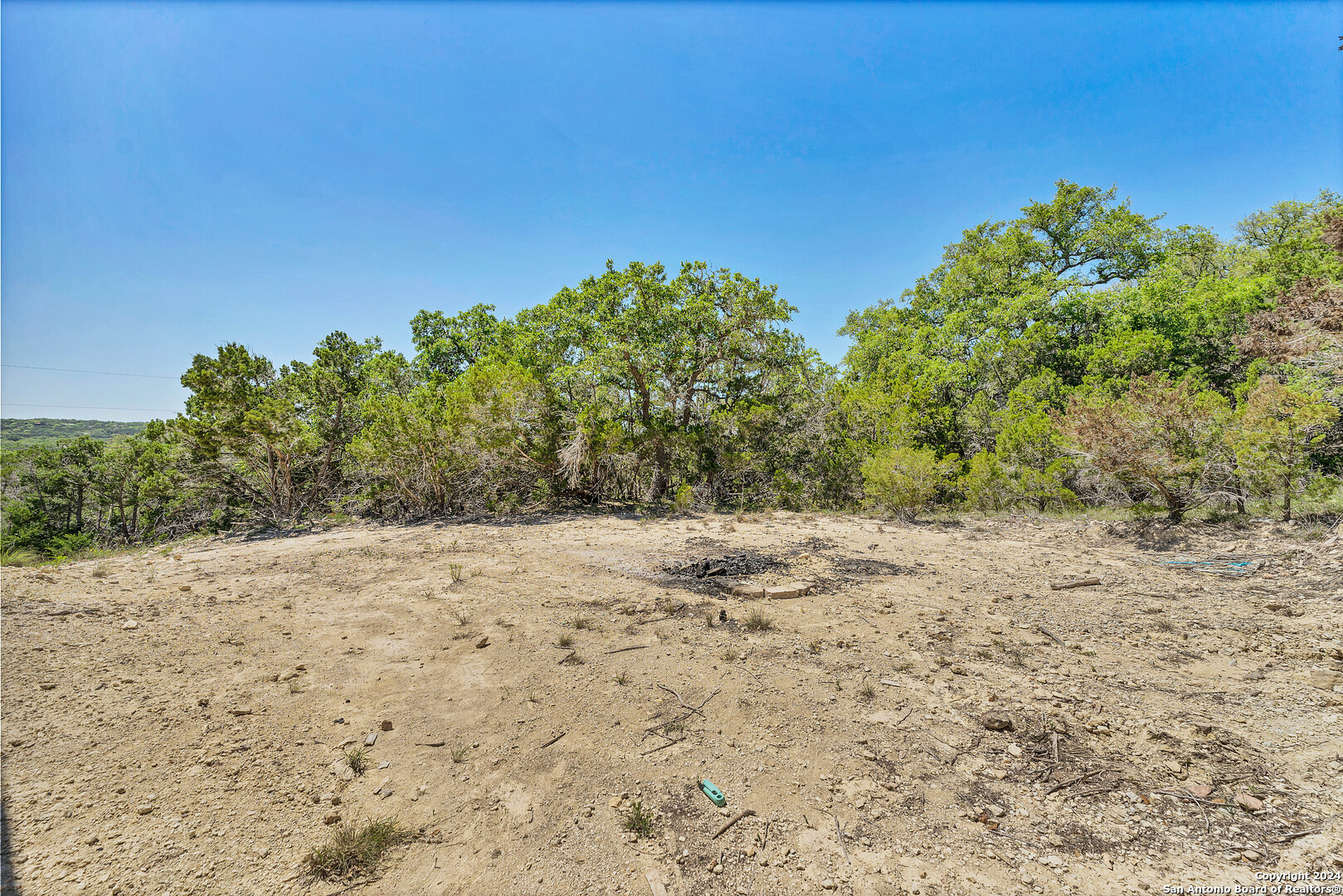 2407 Golf Drive Spring Branch, TX 78070 - Photo 21 of 29 a view of a yard with a tree