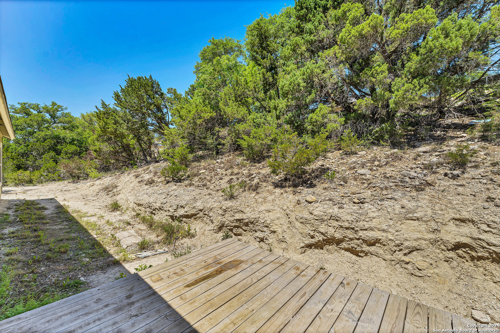 2407 Golf Drive Spring Branch, TX 78070 - Photo 22 of 29 a view of a backyard of the house