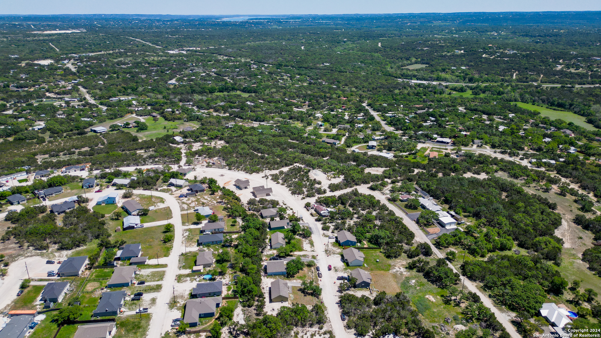 2407 Golf Drive Spring Branch, TX 78070 - Photo 26 of 29 an aerial view of residential houses with city view