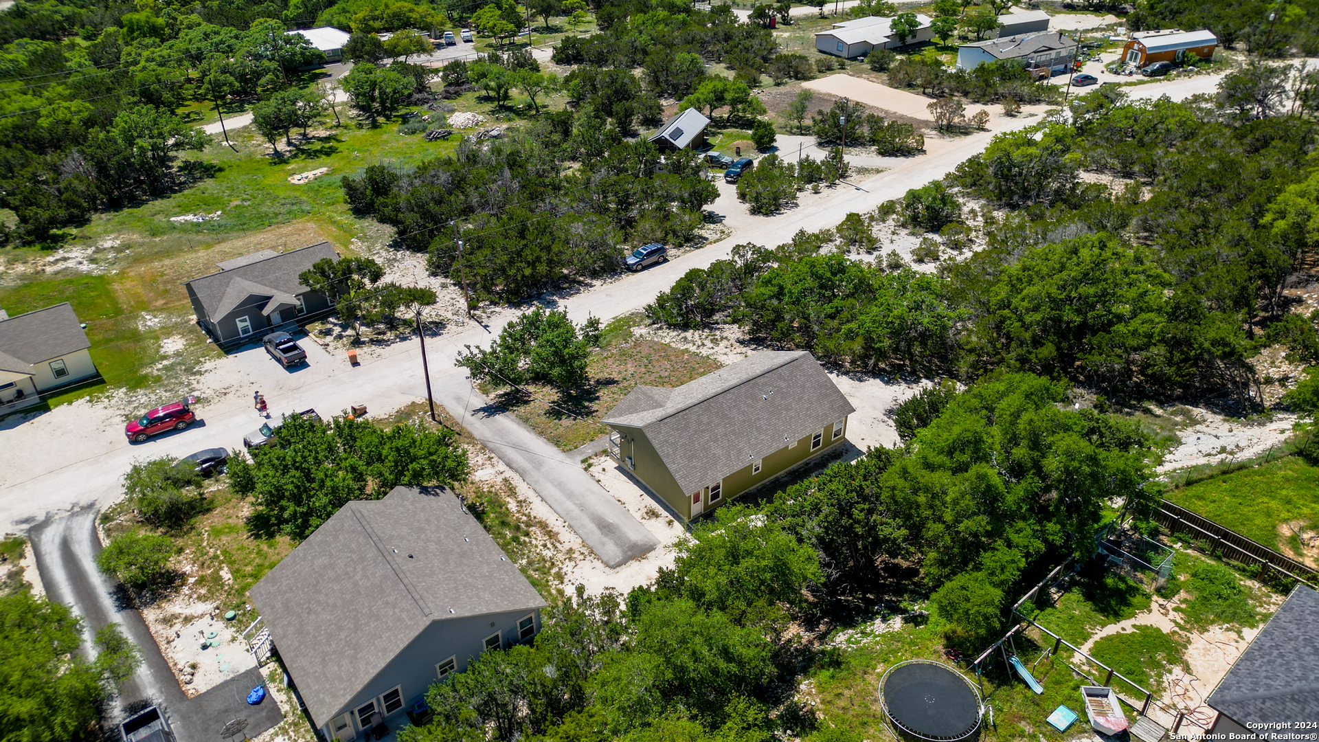 2407 Golf Drive Spring Branch, TX 78070 - Photo 27 of 29 an aerial view of a house with yard