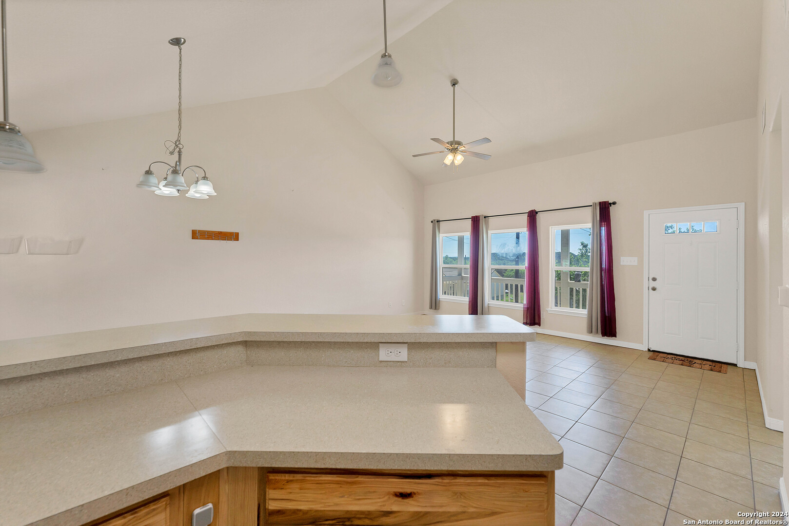 2407 Golf Drive Spring Branch, TX 78070 - Photo 4 of 29 a view of an empty room with chandelier