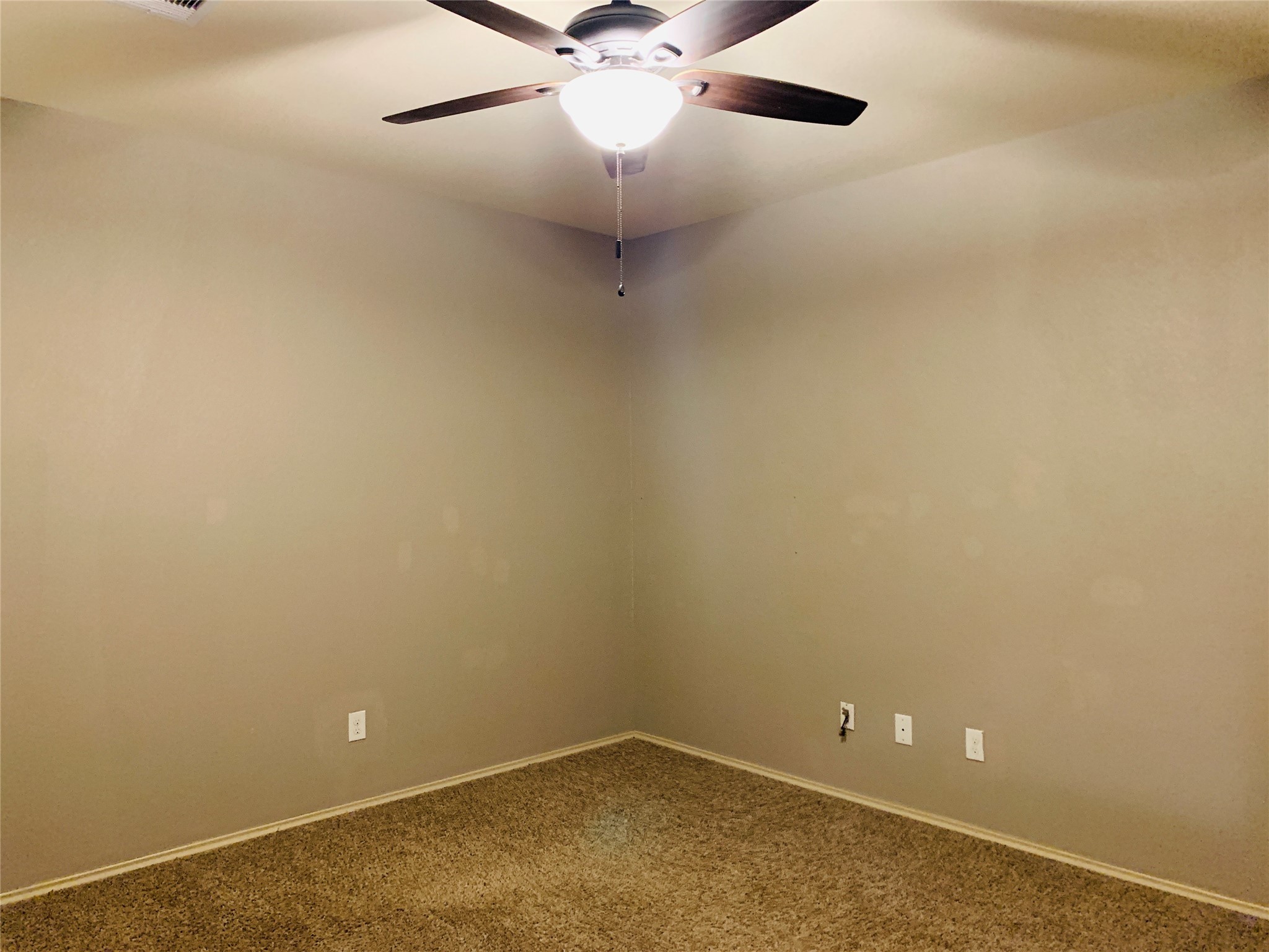 15438 Rancho Joya Way Houston, TX 77049 - Photo 20 of 31 en empty room with a fan and fan