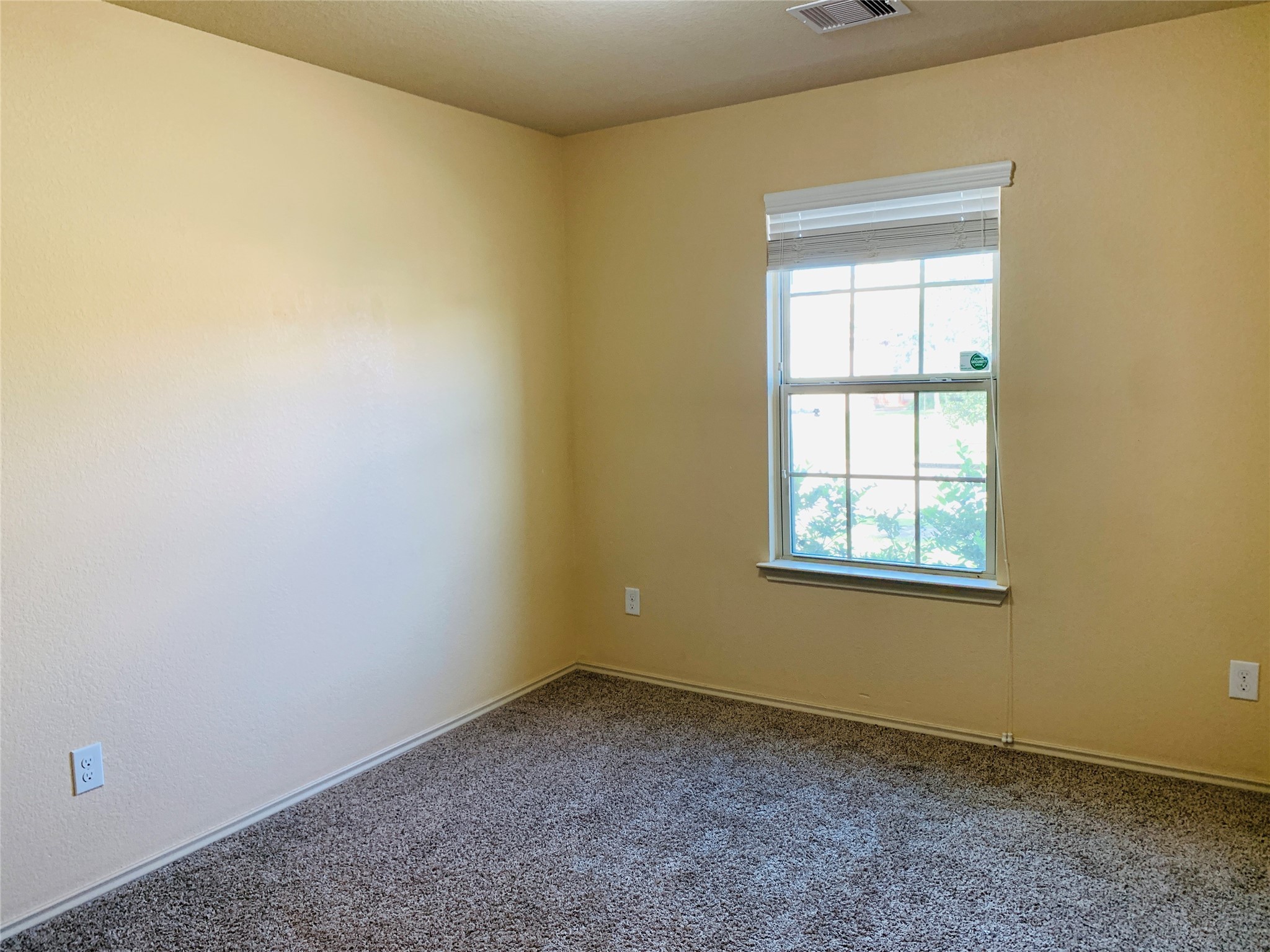 15438 Rancho Joya Way Houston, TX 77049 - Photo 4 of 31 an empty room with a window