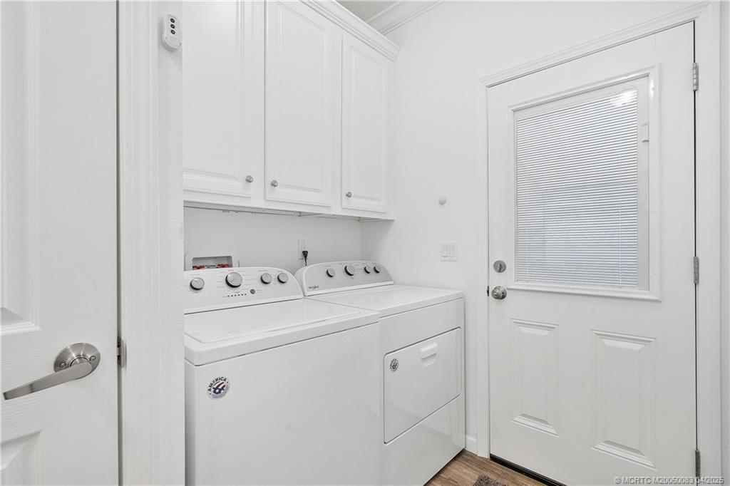 4800 Southeast Federal Highway, Unit 34 Stuart, FL 34997 - Photo 21 of 47 a view of storage and utility room with washer and dryer