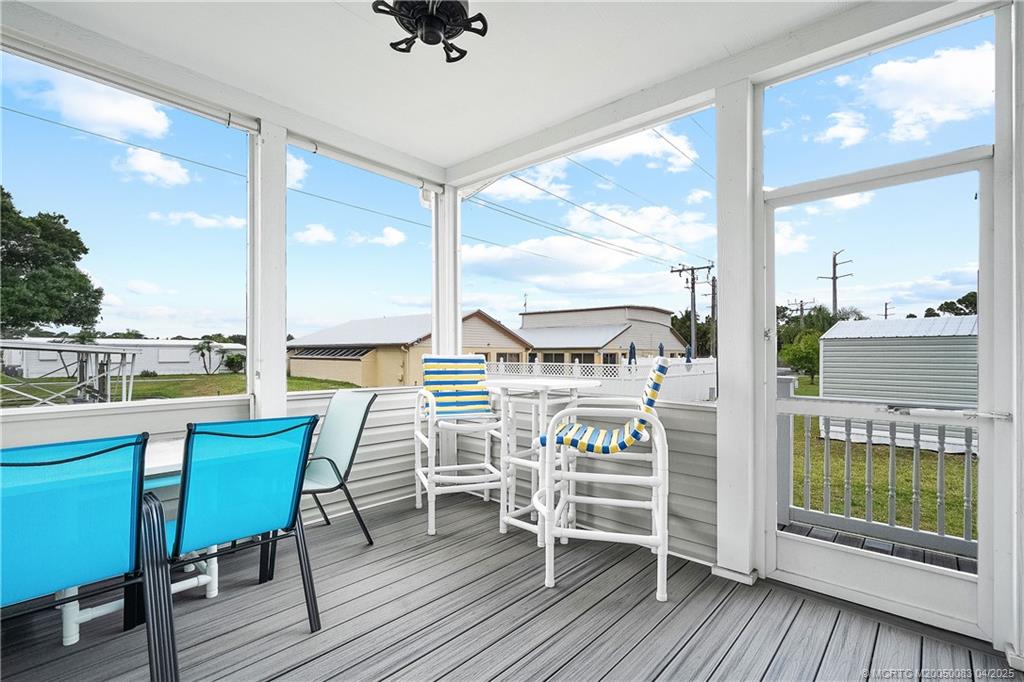 4800 Southeast Federal Highway, Unit 34 Stuart, FL 34997 - Photo 23 of 47 a view of a balcony with chairs