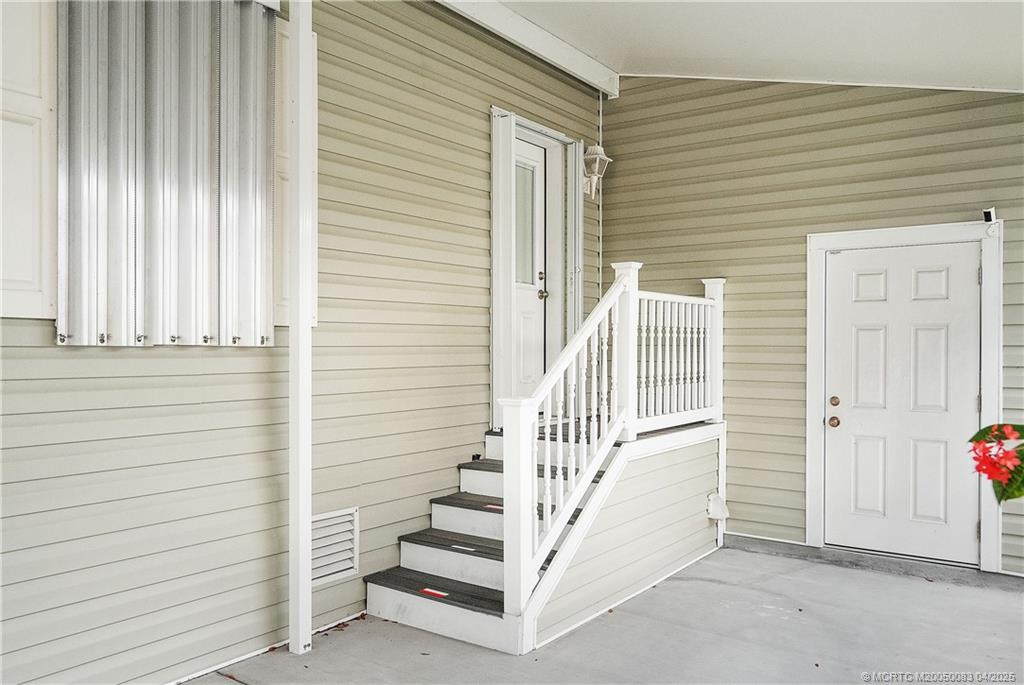 4800 Southeast Federal Highway, Unit 34 Stuart, FL 34997 - Photo 27 of 47 a view of a balcony with stairs