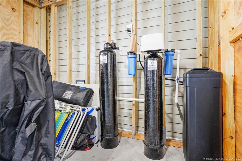 4800 Southeast Federal Highway, Unit 34 Stuart, FL 34997 - Photo 28 of 47 a view of walk in closet with clothes and shoes