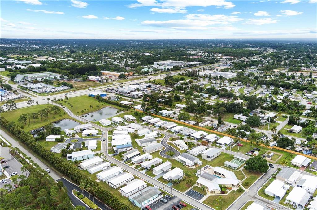 4800 Southeast Federal Highway, Unit 34 Stuart, FL 34997 - Photo 31 of 47 an aerial view of residential houses with city view
