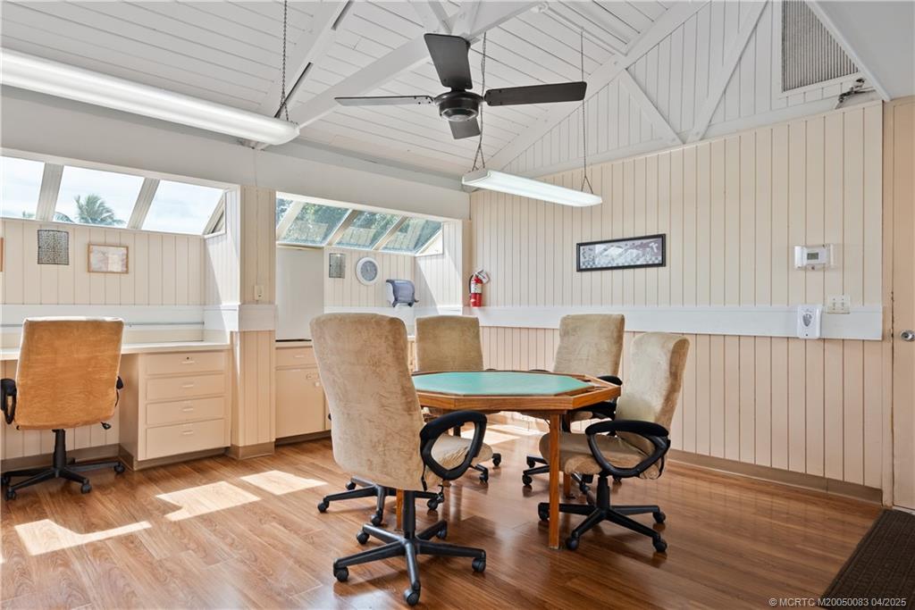 4800 Southeast Federal Highway, Unit 34 Stuart, FL 34997 - Photo 40 of 47 a view of a dining room with furniture window and wooden floor