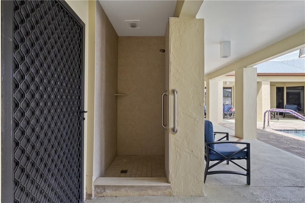 4800 Southeast Federal Highway, Unit 34 Stuart, FL 34997 - Photo 42 of 47 a bathroom with a toilet and a shower